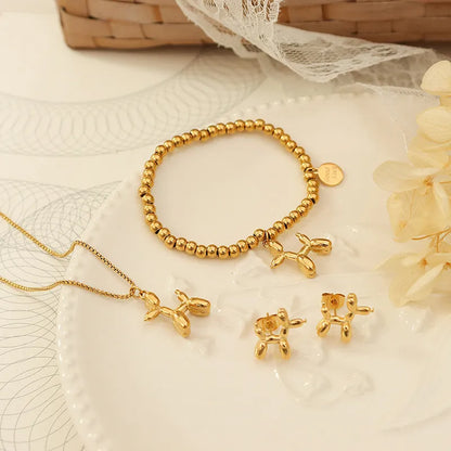 Collier pendentif chiot en acier titane plaqué or 18 carats